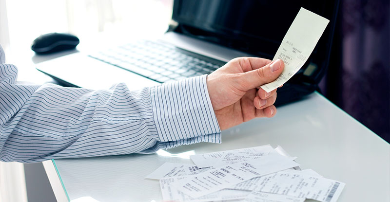 Man going through Itemized Receipt